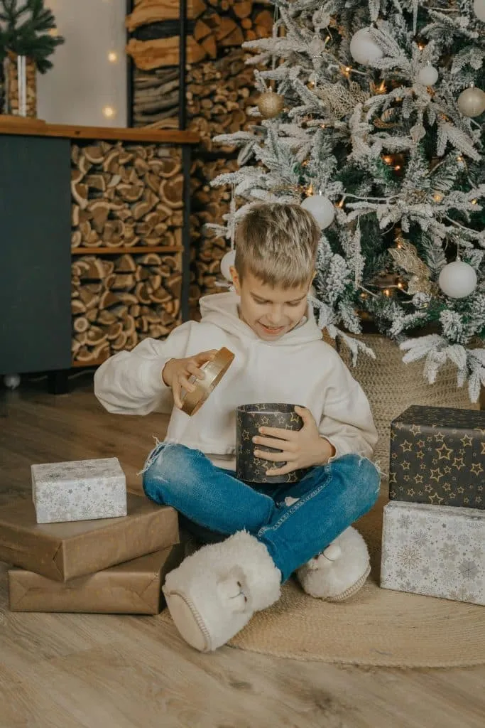 Child in awe in front of the Christmas decorations