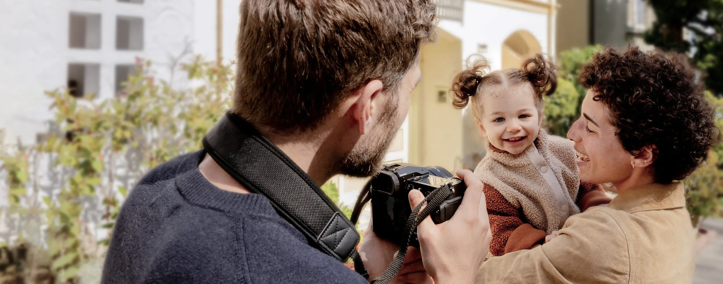 Family looking through their photos stored online